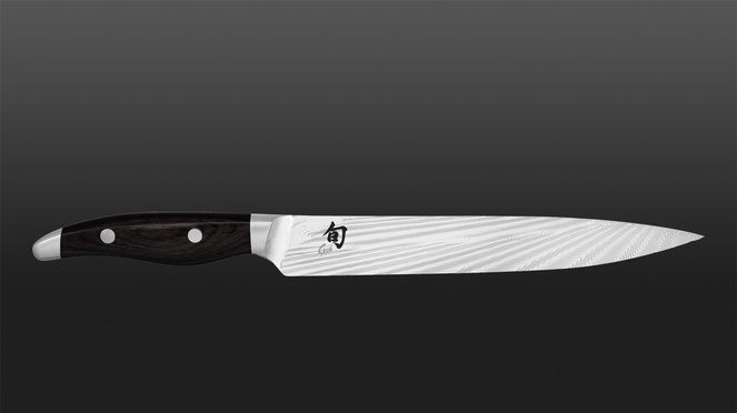 
                    The Shun Nagare Black slicing knife is a top-class meat knife