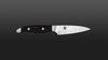 
                    The blade of the Shun Nagare Black paring knife is made of two different types of steel (VG-10 & VG-2)